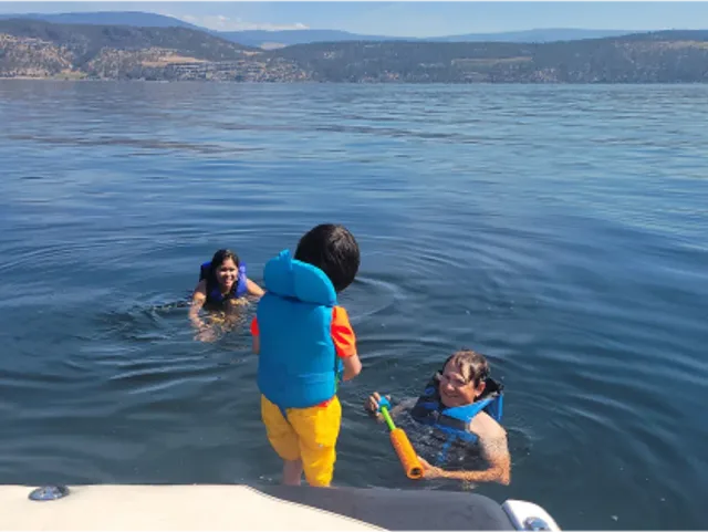 Family enjoying a lake day