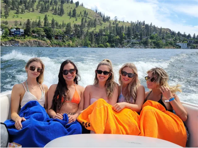 Friends celebrating on a boat